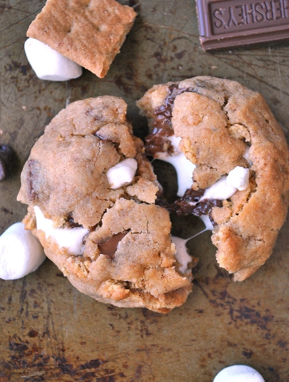 Marshmallow Stuffed S'mores Cookies overhead being pulled apart