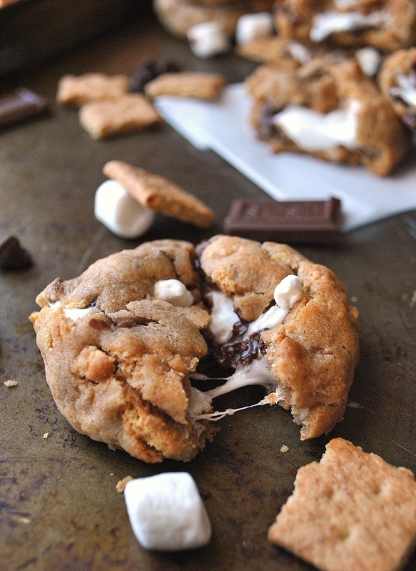 S'mores Stuffed Cookies being pulled apart with marshmallow filling coming out
