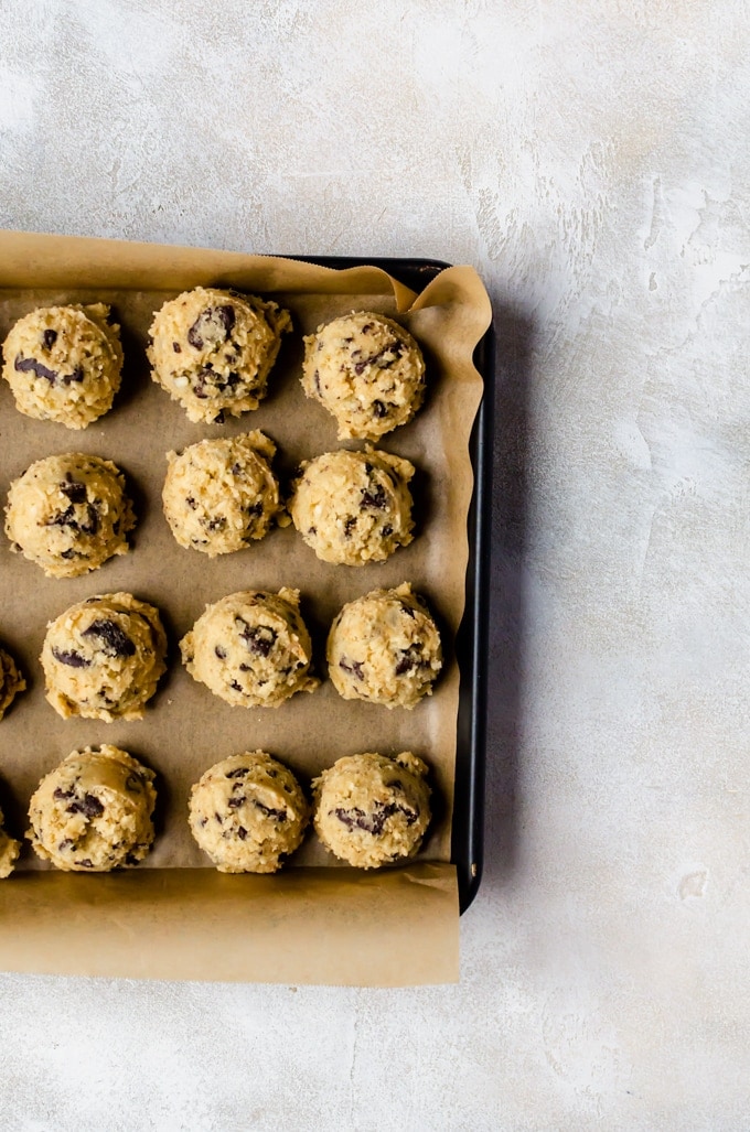 Unbaked tray of coconut chocolate chip cookies