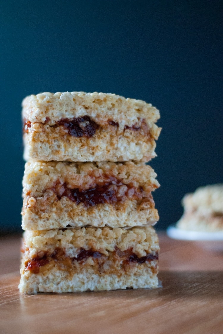 Peanut Butter and Jelly Rice Krispie Treats. Two of your childhood favorites in one to make the ultimate dessert | cookienameddesire.com