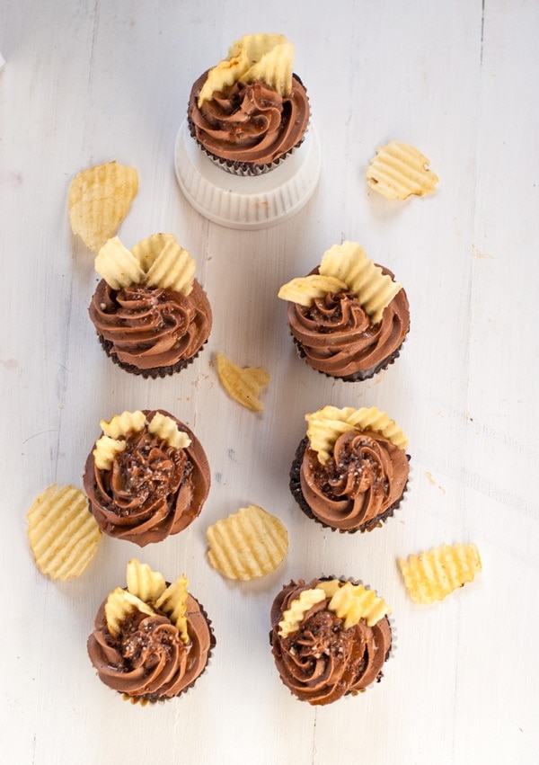 Incredible chocolate  cupcakes with coffee glaze, chocolate ganache, right chocolate buttercream, caramel drizzle, fleur de sel and potato chips. Heaven in a cupcake. 