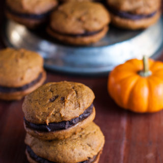 Pumpkin whoopie pies with a caramel glaze and boozy ganache filling - yes, please ! @cookiedesire