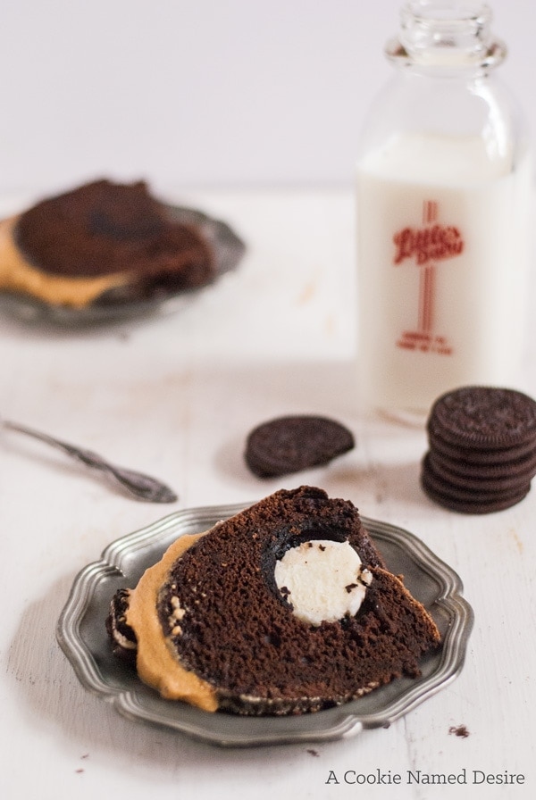 A ridiculously addictive Oreo cake with peanut butter frosting made with Oreo flour. At our home, we call this The Crack Cake.