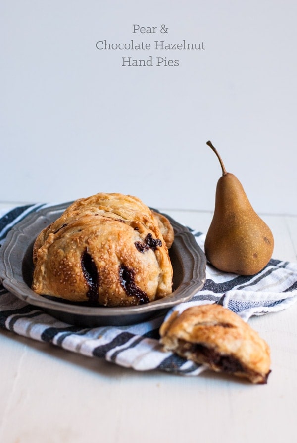 Pear and chocolate hazelnut hand pies with an incredibly flaky pie crust. Seriously, the best pie I've ever had! 