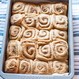 Sticky rolls with a pecan bourbon maple filling and eggnog glaze - perfect for the holidays!
