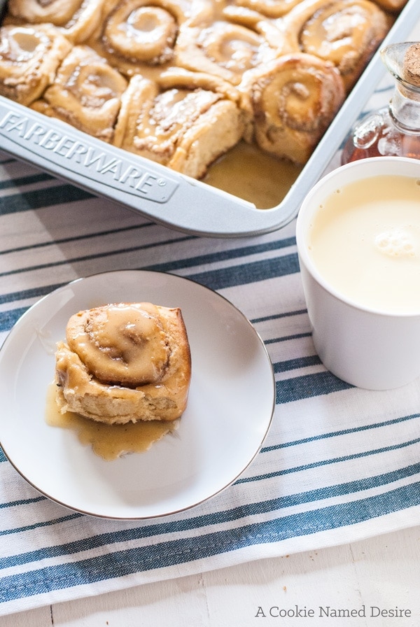 Sticky rolls with a pecan bourbon maple filling and eggnog glaze - perfect for the holidays! 