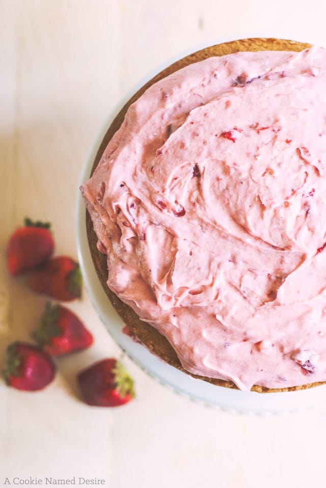 A delicious yellow butter cake with strawberry mint buttercream frosting