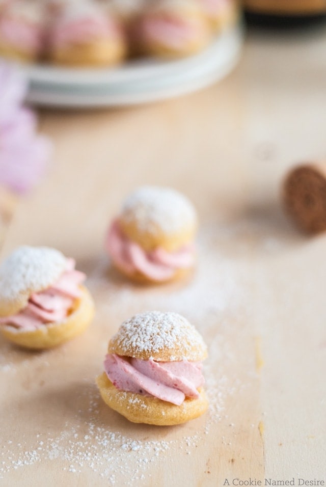 Dainty strawberry cream profiteroles