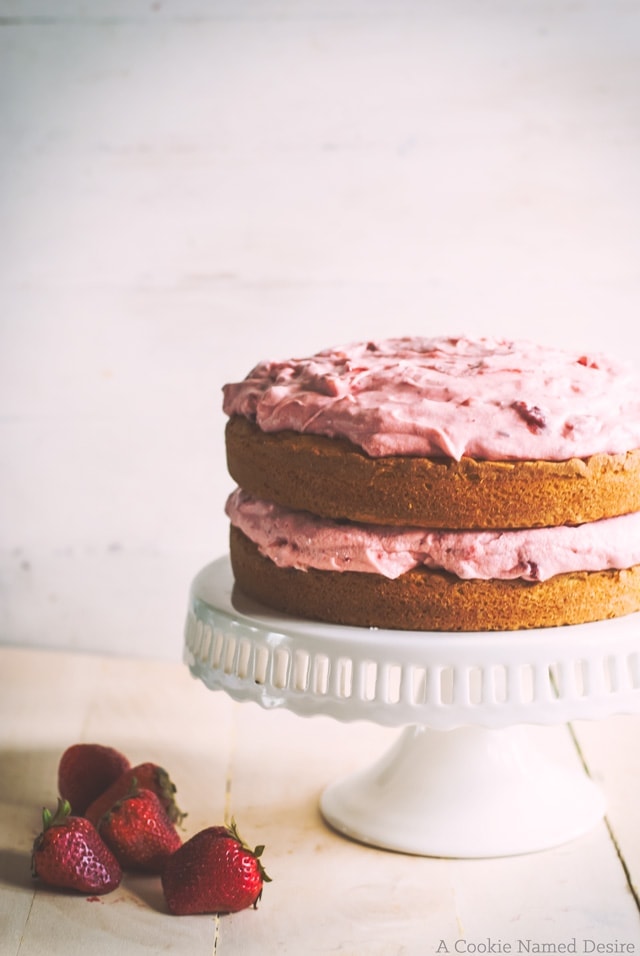 Yellow butter birthday cake with strawberry mint buttercream frosting