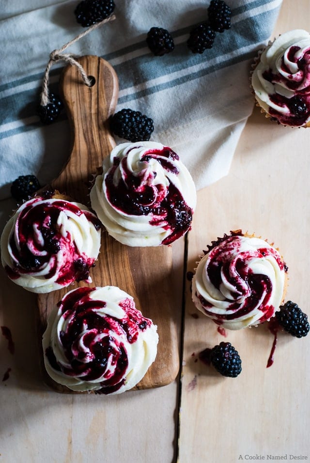 Blackberry cupcakes with lime frosting and blackberry drizzle