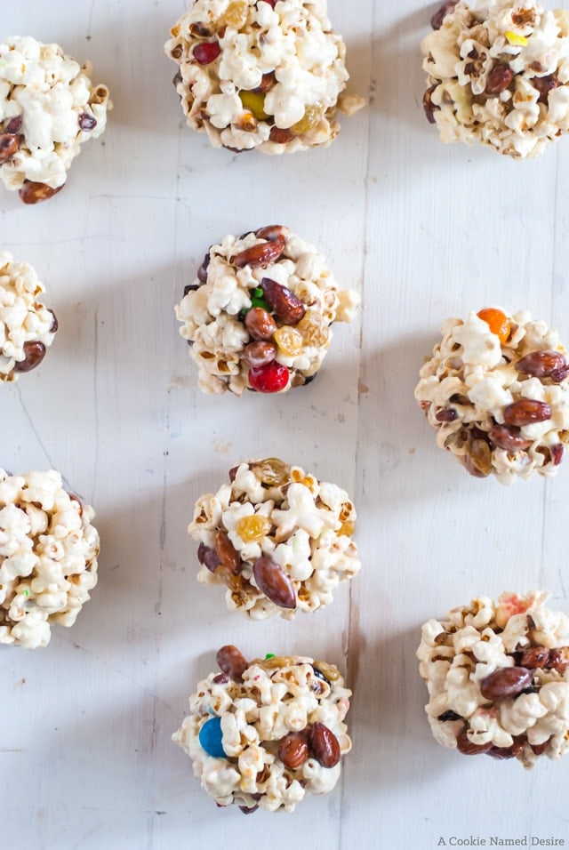 These super simply trail mix popcorn balls are great for enjoying the outdoors, or cuddling up to a good movie. 