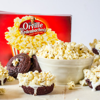 Red velvet doughnuts with marshmallow topping and Orville popcorn