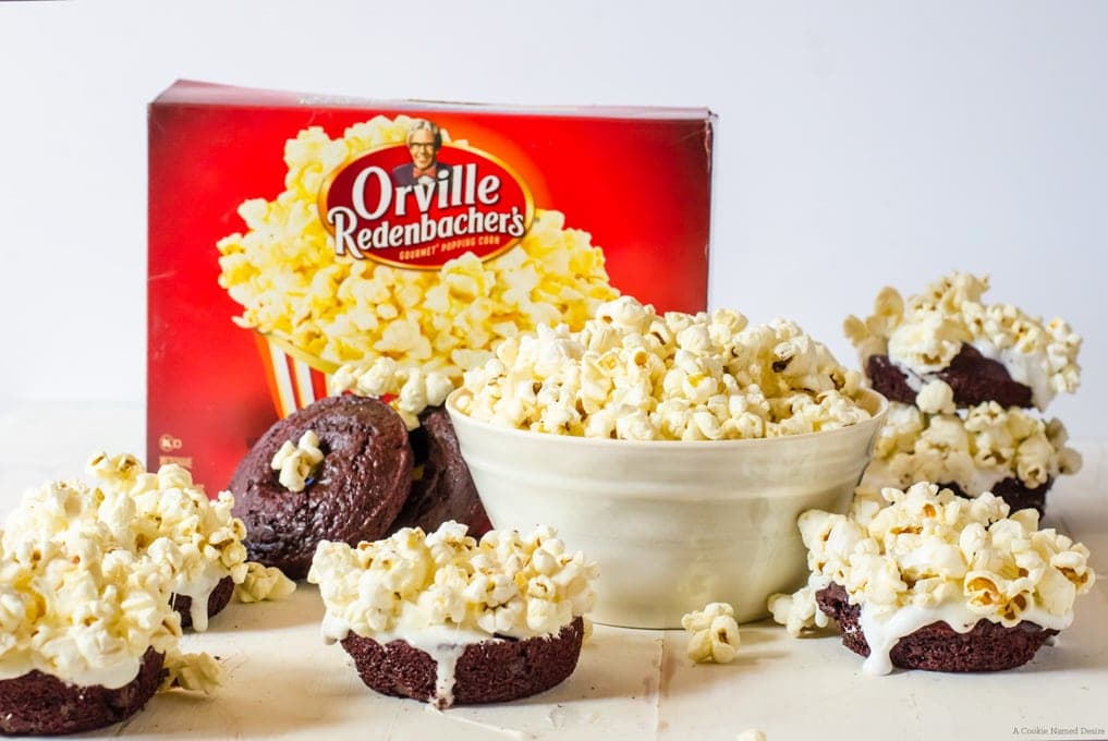 Red velvet doughnuts with marshmallow topping and Orville popcorn