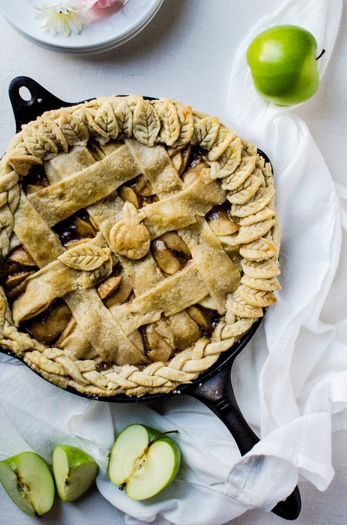 A rich caramel skillet apple pie with a flaky and buttery crust. 