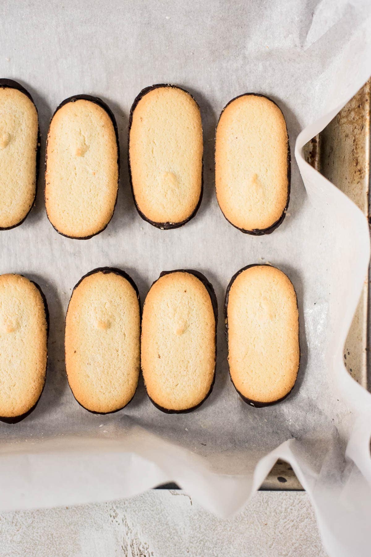 cookies lined up in baking sheet