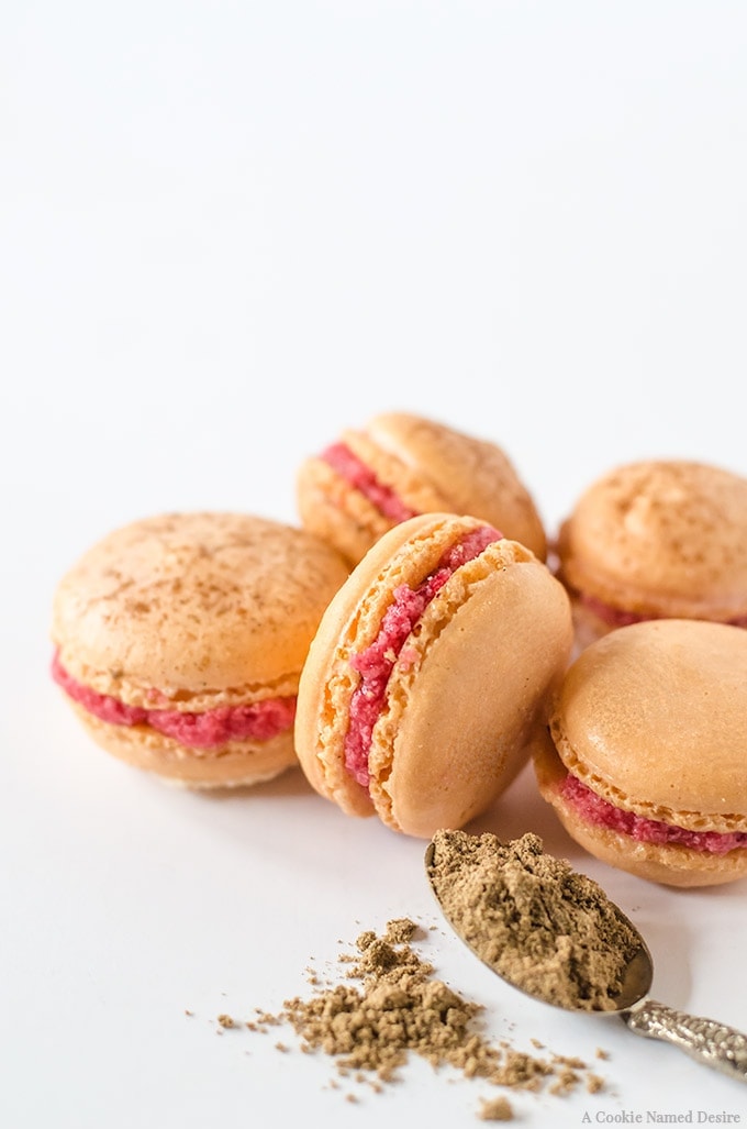 These mulled cranberry macarons are lightly dusted with cardamom and cinnamon, then filled with a creamy mulled cranberry buttercream