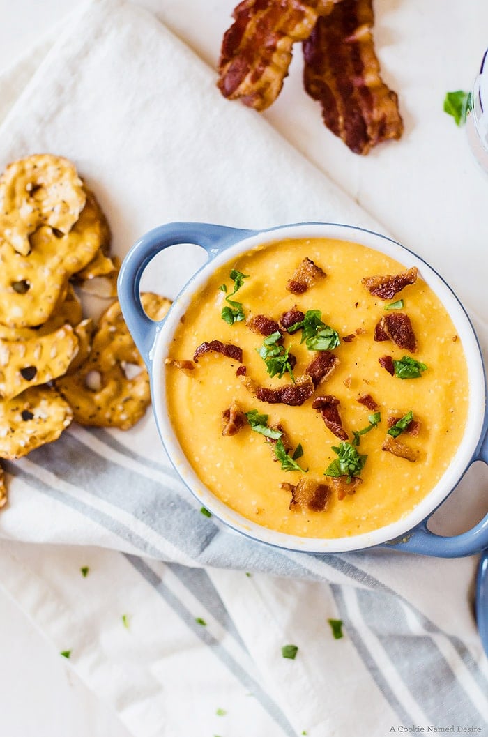 Deliciously irresistible bacon beer cheese dip. Perfect for all your game day parties!