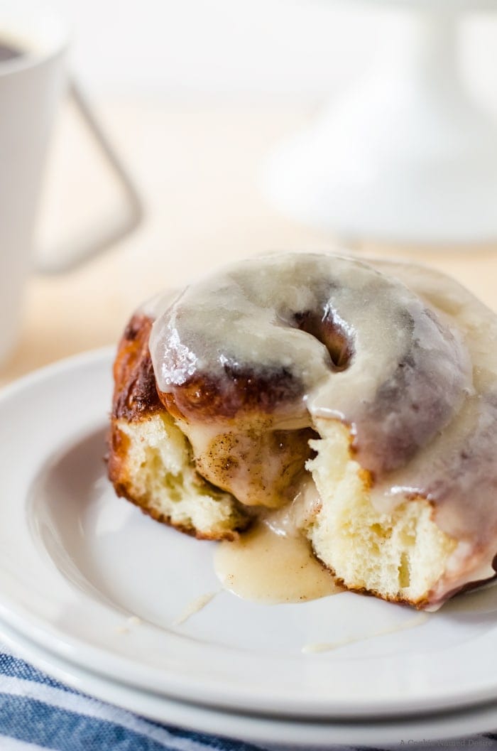 Cinnamon roll doughnuts with cream cheese glaze. Cinnamon rolls and doughnuts had a baby and it. is. glorious! 