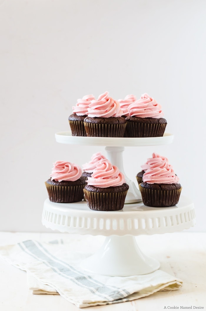 Sweet and vibrant blood orange chocolate cupcakes filled with a creamy blood orange curd. A delectable dessert your friends will be begging for the recipe! 