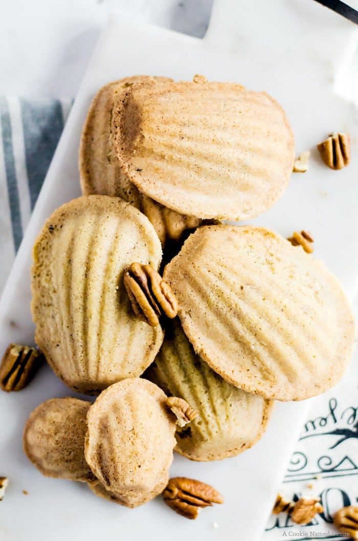 Brown butter pecan madeleines are the epitome of rich and indulgent nutty flavor. The brown butter gives the madeleines and intoxicating aroma and the pecans add a welcome crunch. These dainty cookies are best served fresh from the oven while they are still warm, making them an incredible wintertime treat. 