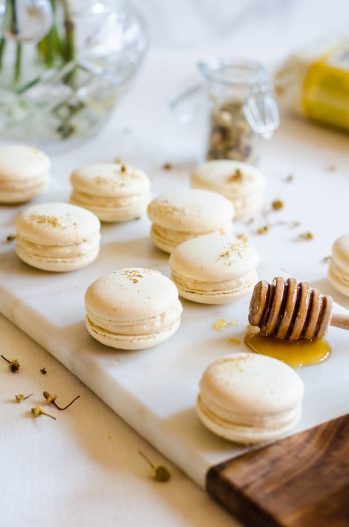 These chamomile and caramelized honey macarons are the perfect treat for all your spring gatherings. The macaron shells are delicately flavored with chamomile and filled with a lightly salted caramelized honey buttercream. It’s Spring in a single bite.