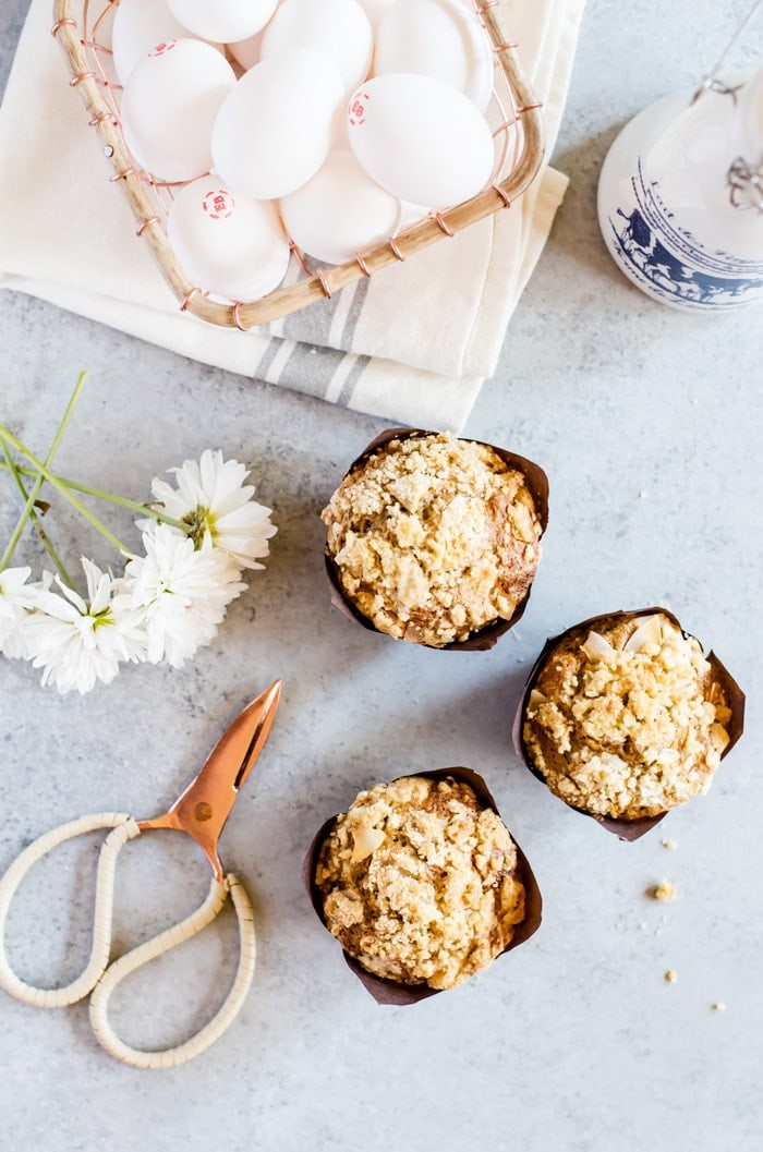 Light and fluffy carrot cake muffins with crumb topping. These muffins have the perfect blend of sweetness, spice, and lots of crumb topping.