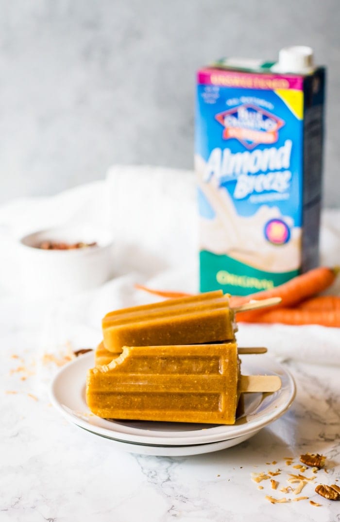 Carrot cake popsicles are a delightfully refreshing take on the classic cake. Made with fresh carrots and all the aromatic spices and flavors we love in traditional carrot cake. This simple popsicle recipe is made easily in a blender in just moments!