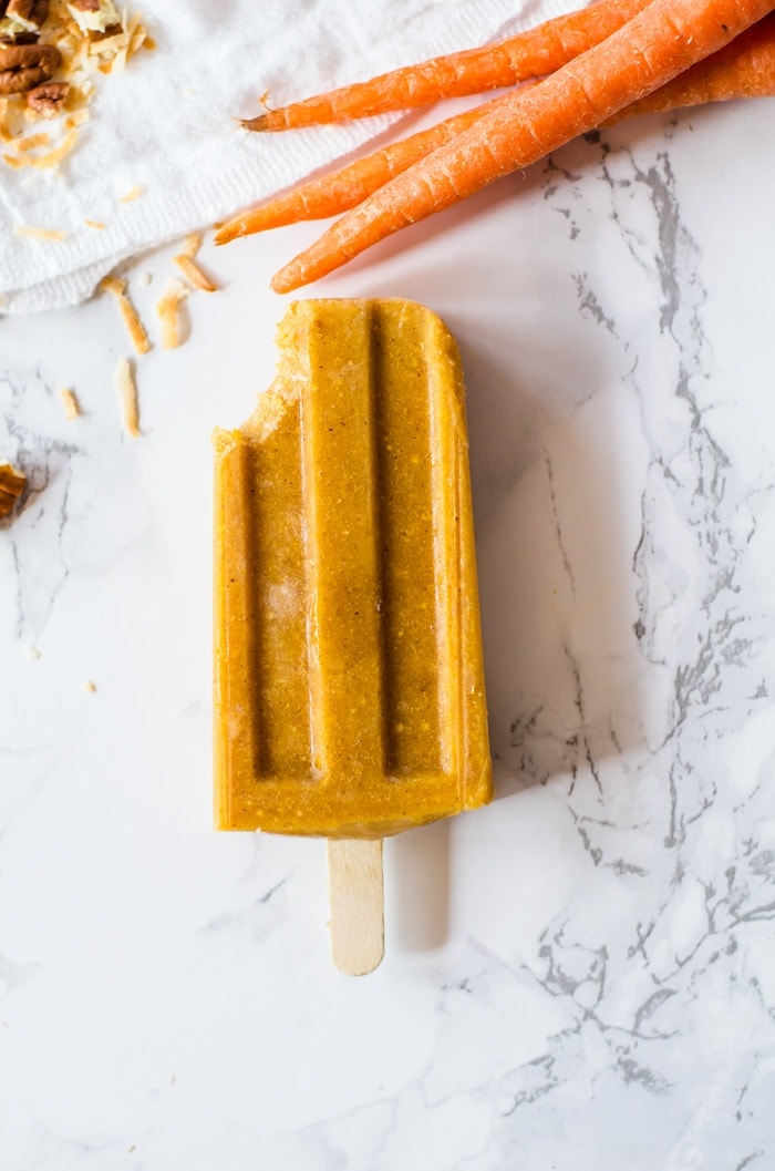 Carrot cake popsicles are a delightfully refreshing take on the classic cake. Made with fresh carrots and all the aromatic spices and flavors we love in traditional carrot cake. This simple popsicle recipe is made easily in a blender in just moments!