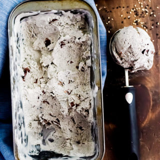Black sesame ice cream is a sweet, nutty, and unique treat complemented with shards of chocolate studded throughout. You are going to fall in love with its fun color and rich, roasted flavor.
