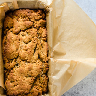 A dense coconut cinnamon bread made with different types of coconut and a hint of cinnamon.