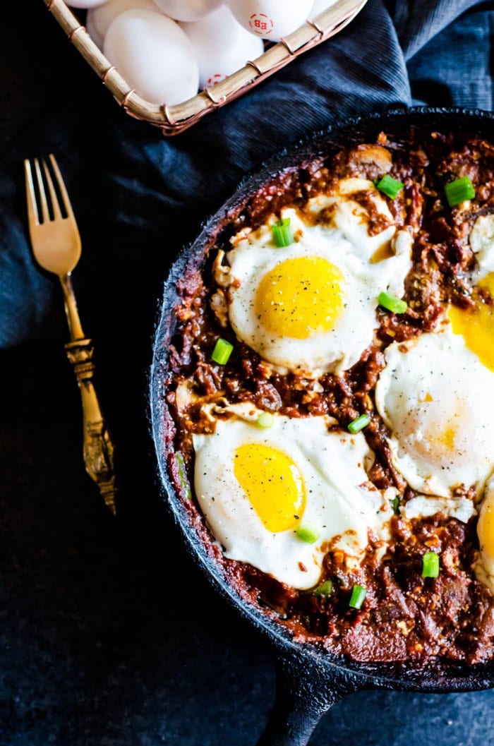 A chunky vegetable shakshuka unlike any traditional eggs in hell dish. This version is full of hearty flavorful vegetables mix in the spicy tomato base for a breakfast that will keep you fuller for longer. Feta is studded throughout the dish for an added salty twist. 