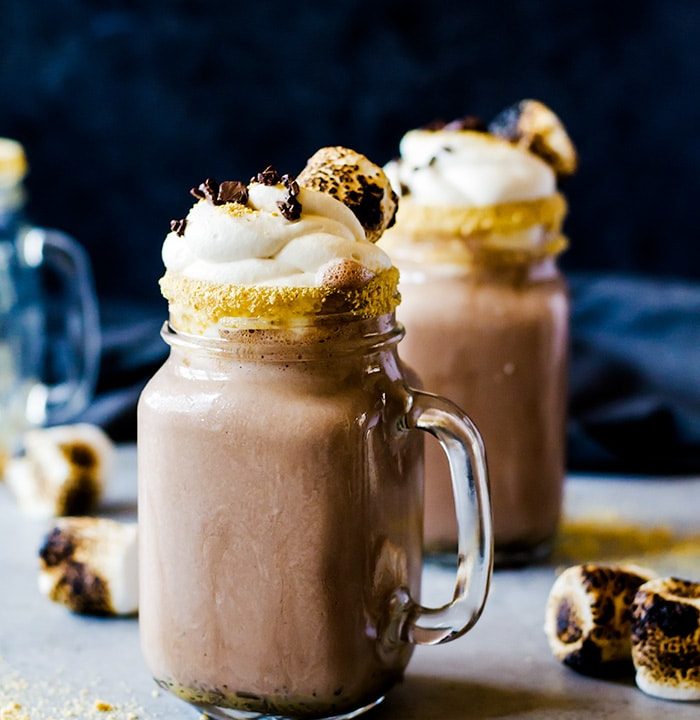 This boozy s'mores milkshake is everything! Blended with your favorite rich chocolate ice cream and roasted marshmallows for the ultimate campfire flavor. You won't want to drink anything else.