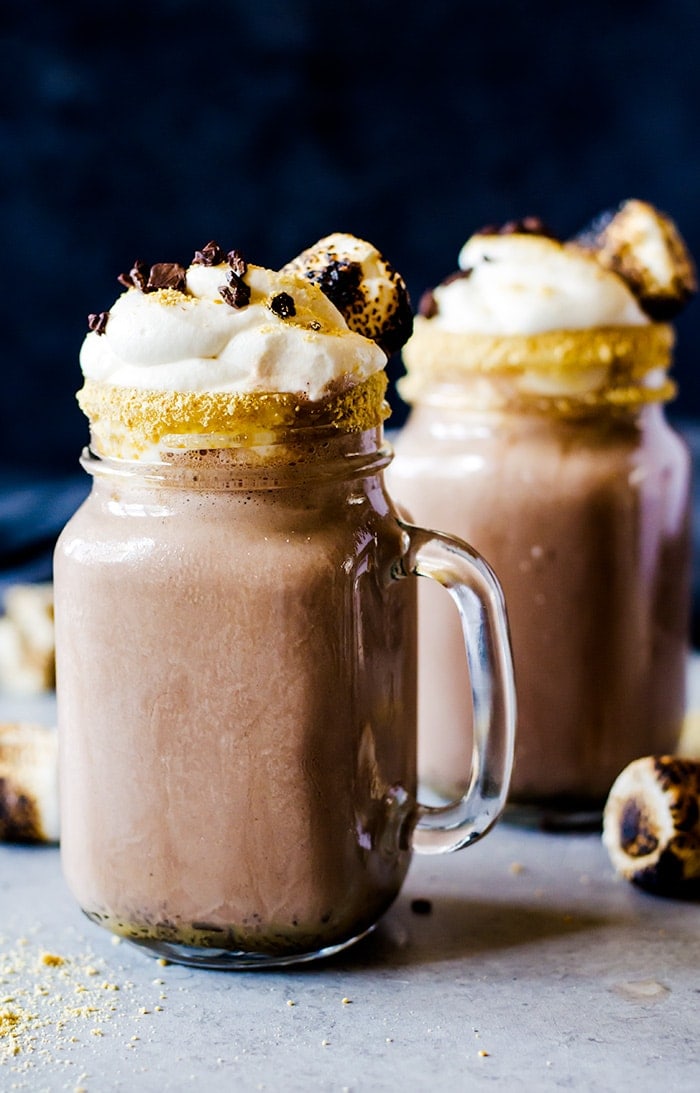 This boozy s'mores milkshake is everything! Blended with your favorite rich chocolate ice cream and roasted marshmallows for the ultimate campfire flavor. You won't want to drink anything else.