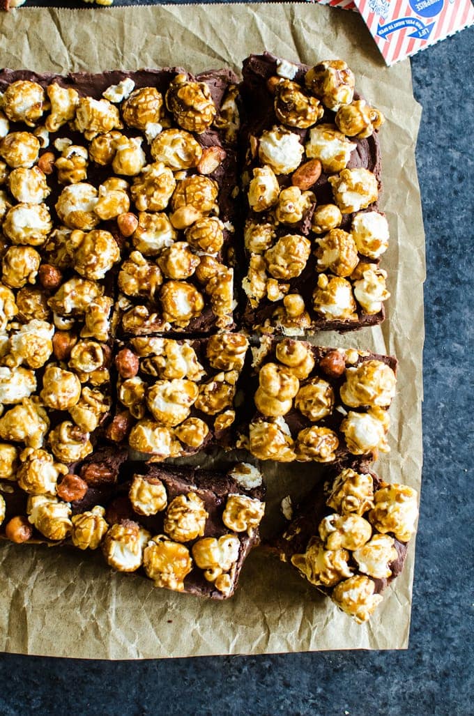 The easiest chocolate caramel fudge topped with the amazing cracker jack popcorn. Is this your new favorite dessert? I think so!