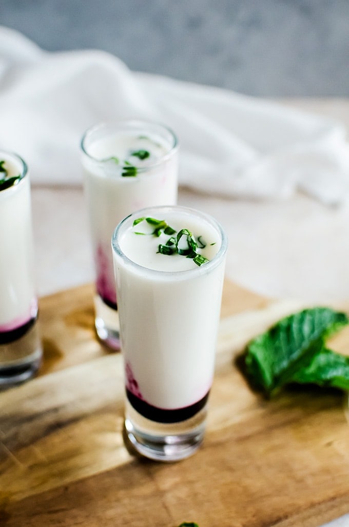 A creamy and irresistible coconut lime mojito shooter with a blueberry swirl. Aka the best shot you will ever make. 