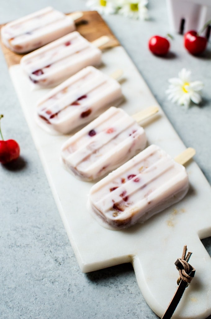 Try to not eat the entire batch of these lychee cherry frozen yogurt popsicles. 