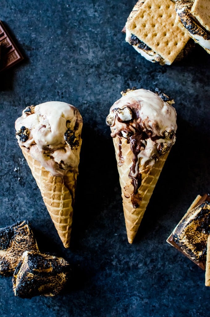 Graham cracker infused ice cream with swirls of chocolate and tons of roasted marshmallows. This s'mores ice cream has it all.