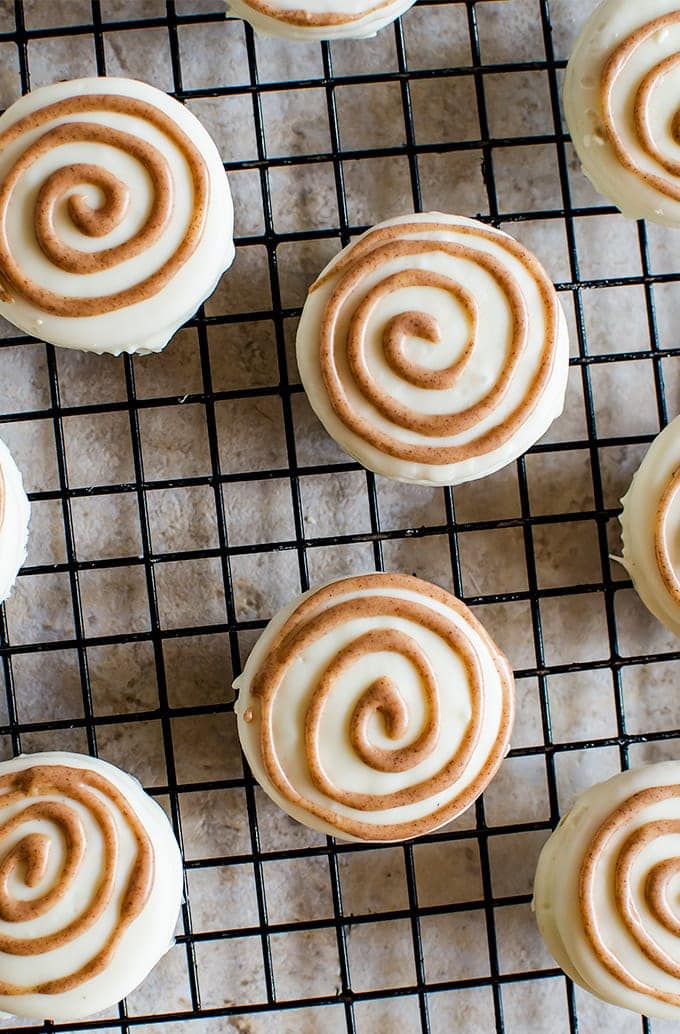 white chocolate covered oreos on wire rack 