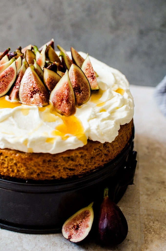 close up of cake drizzled with honey