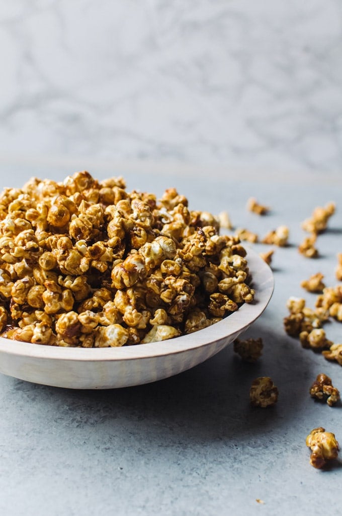 Hot Toddy and caramel popcorn meet to create a warm, cozy, and highly addictive snack