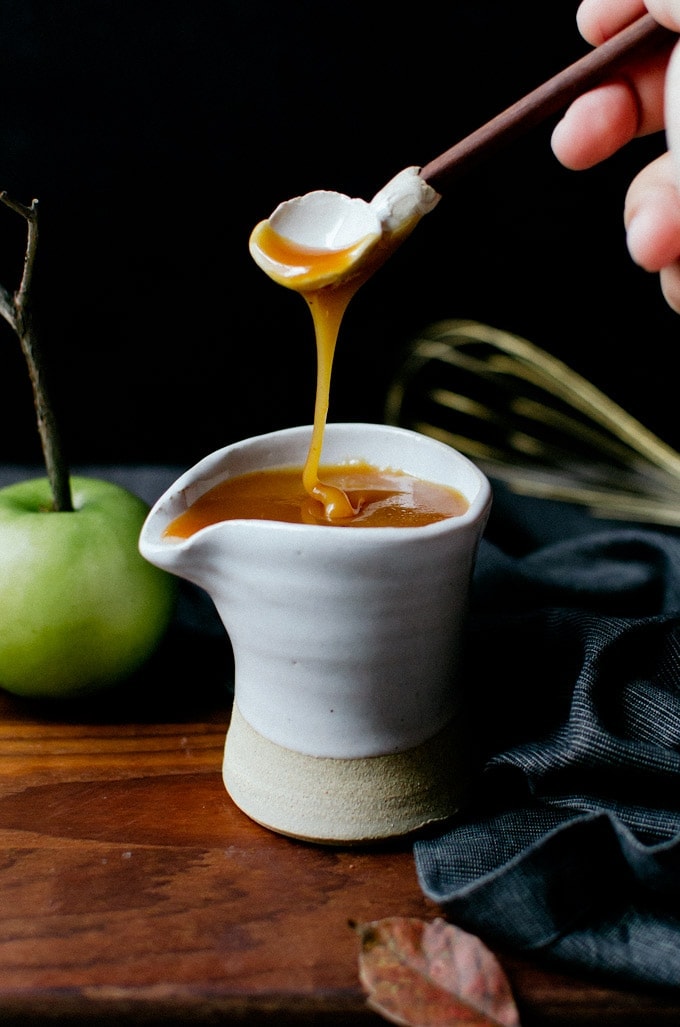 A sweet fall-inspired apple cider caramel sauce that you will want to use on everything!