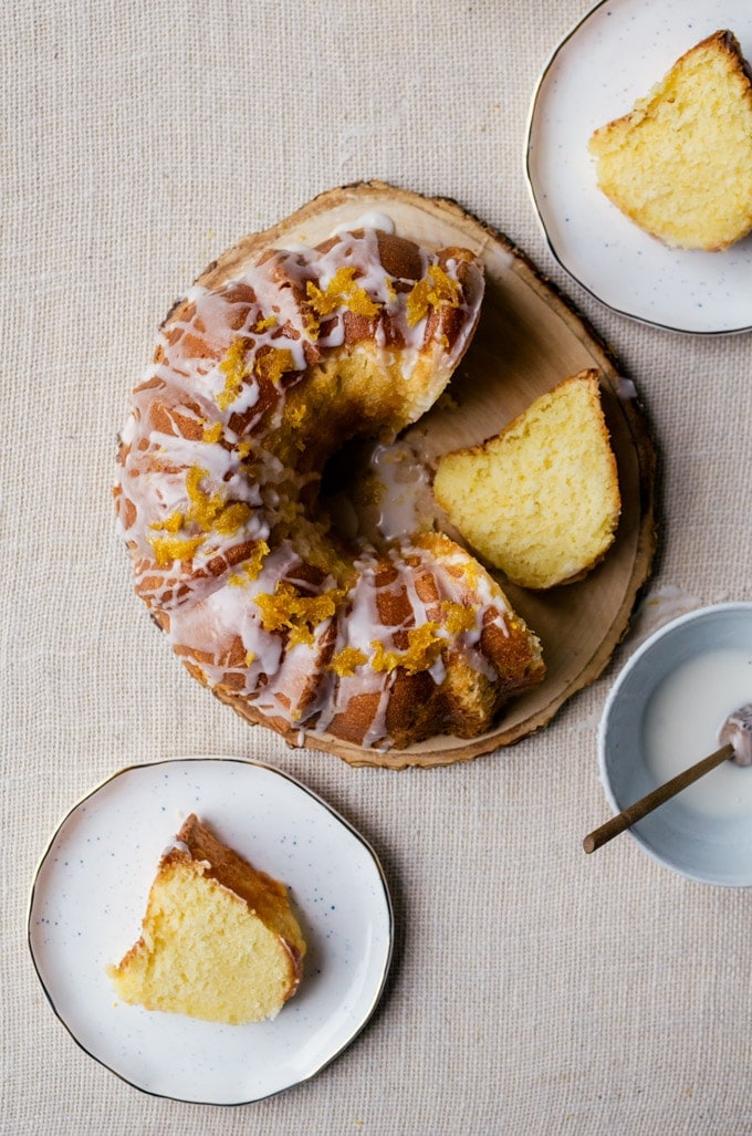 cake on plates and being sliced