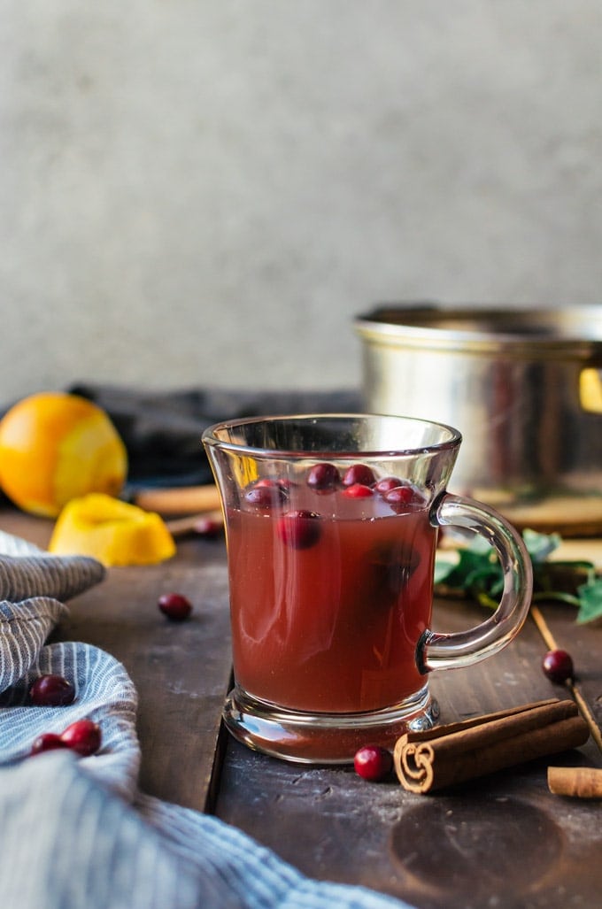 A deliciously warm and cozy mulled apple cider with cranberry