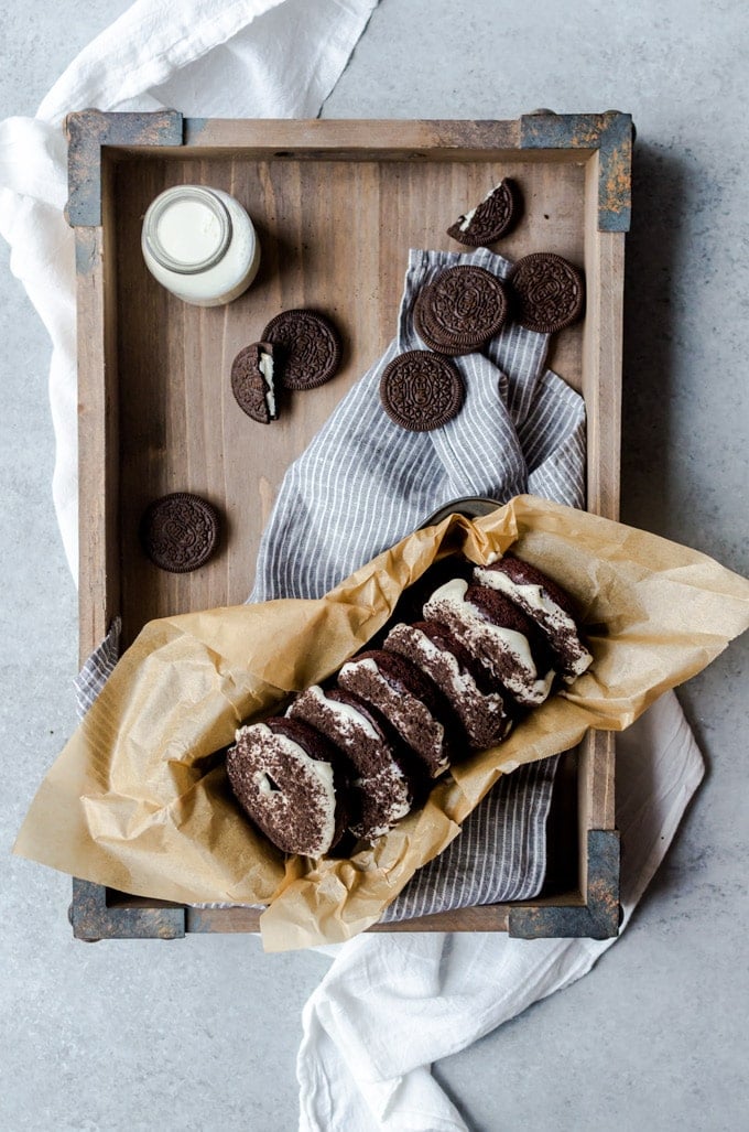 oreo donuts in tray with milk and cookies