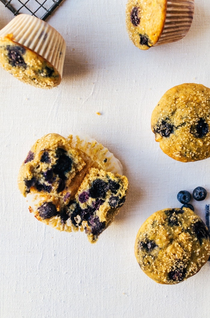close up of muffin showing all the blueberries inside