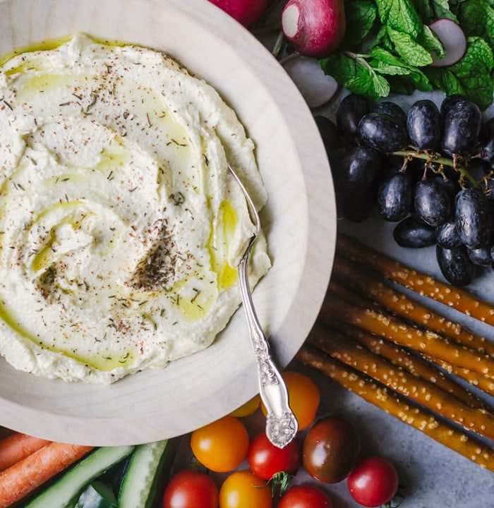 This whipped feta dip is perfect as an app for parties or as a spread in sandwiches and wraps