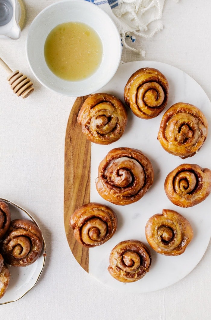 You won't be able to have just one of these homemade honey buns. Soft, sweet, and melt-in-your-mouth incredible; everyone will go head over heels with these doughnuts