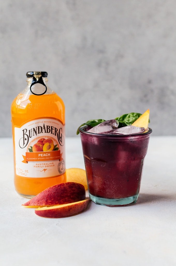 Make summer the best with this blueberry basil peach fizz