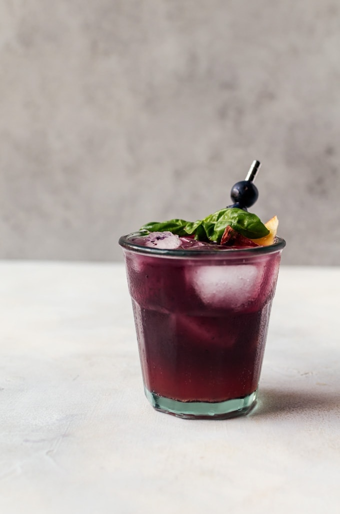 A refreshing and irresistible blueberry peach fizz