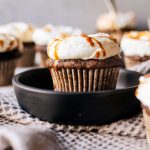 The perfect balance of coffee and pumpkin spice meet in an irresistible cupcake topped with airy whipped cream and finished with caramel